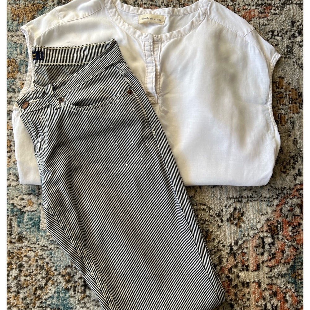 Super low Levi’s 524 jeans. Pinstripe with light paint splatter. Size 5